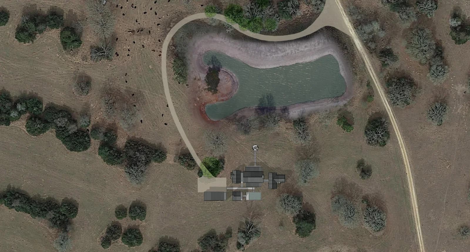 Aerial view of the Chaparral Ranch house and its pond