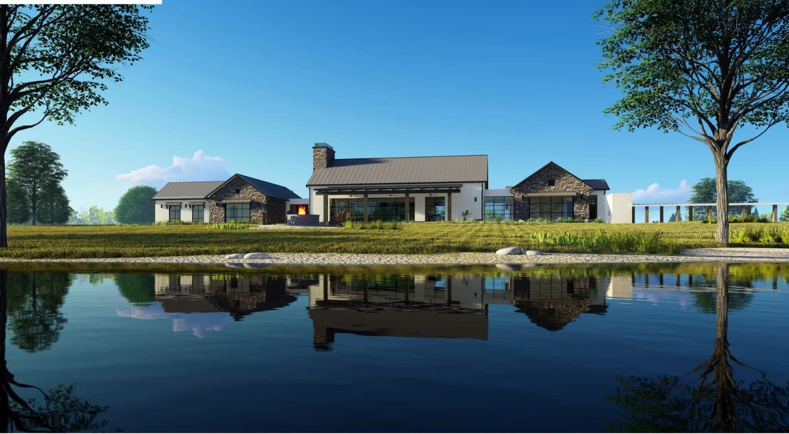 Chaparral Ranch residence seen across a private lake at dusk