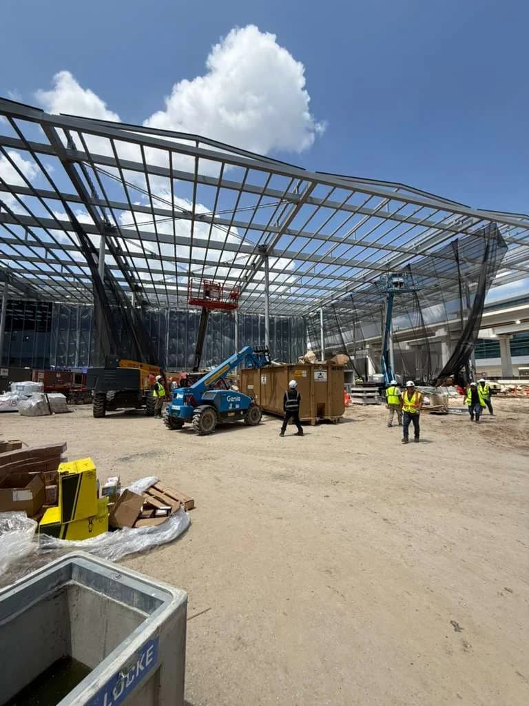 Construction crew working on a structural steel frame
