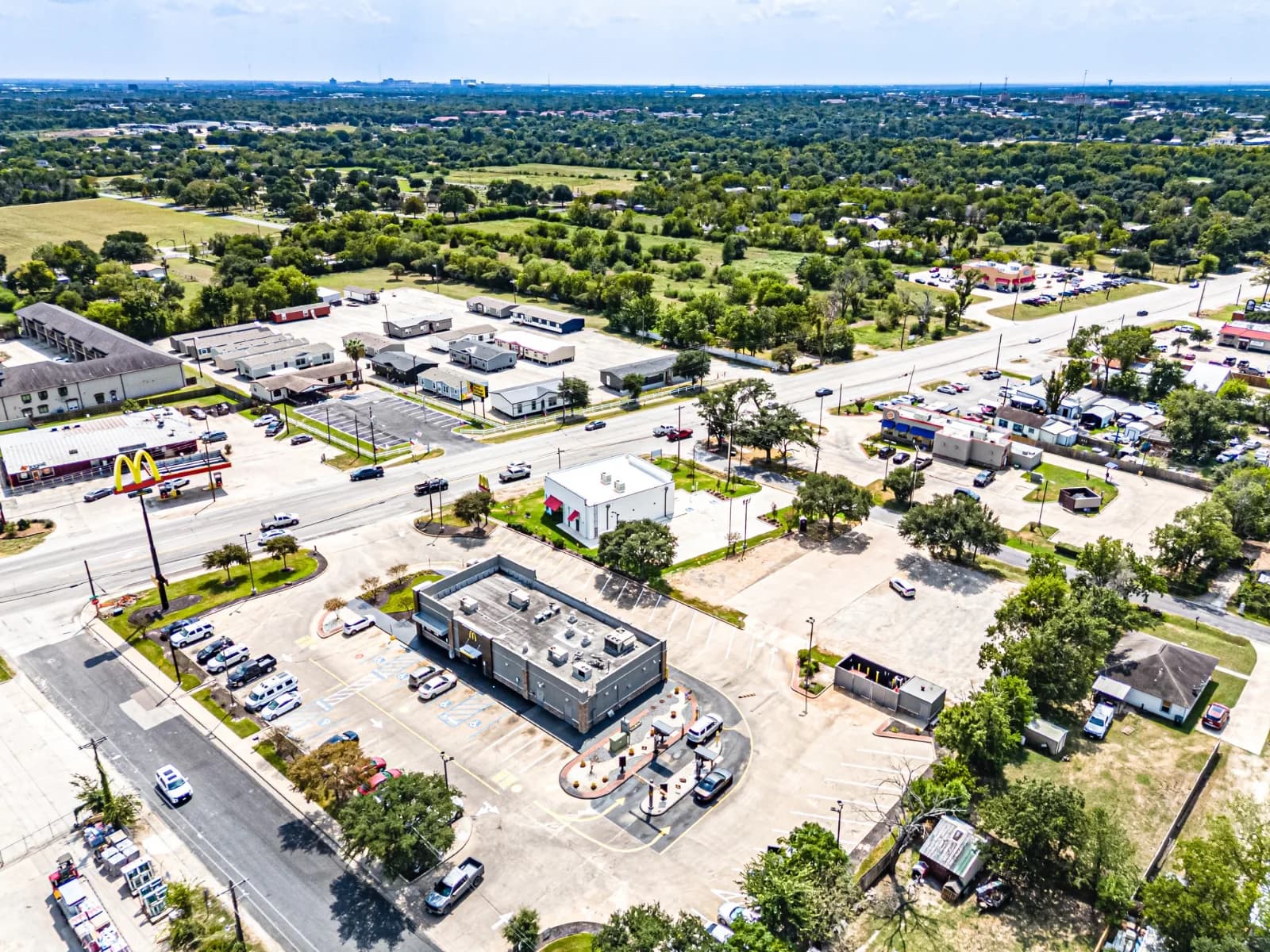 Aerial view of the Verizon Kemah store beside the Shoppes of Kemah center